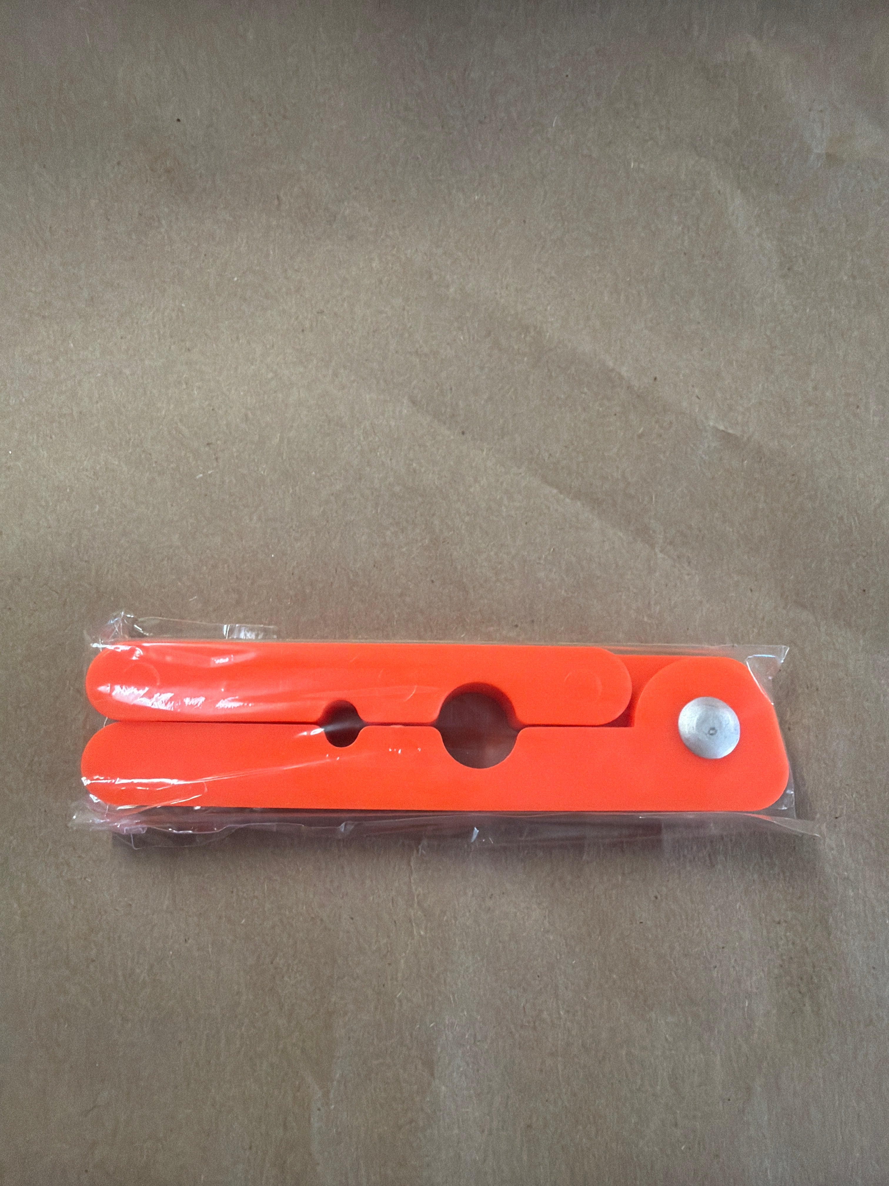 Plastic tail stripper